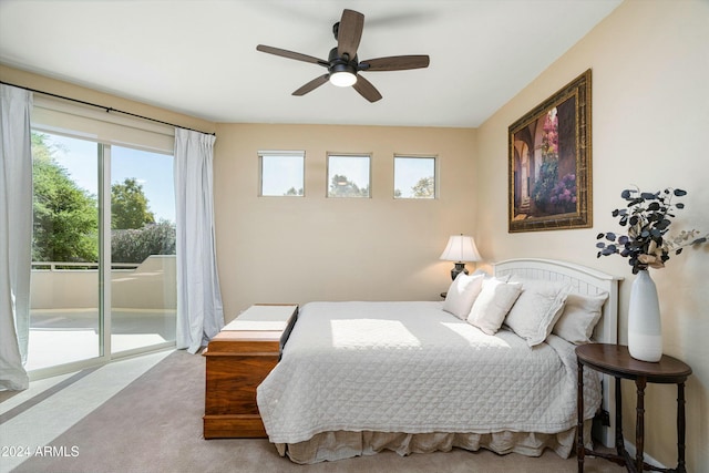 bedroom with ceiling fan, carpet flooring, and access to exterior