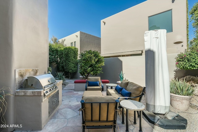 view of patio / terrace with exterior kitchen and grilling area