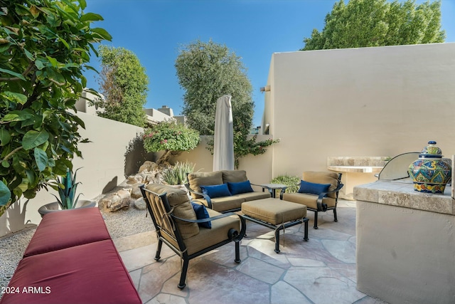 view of patio / terrace with a fenced backyard and outdoor lounge area