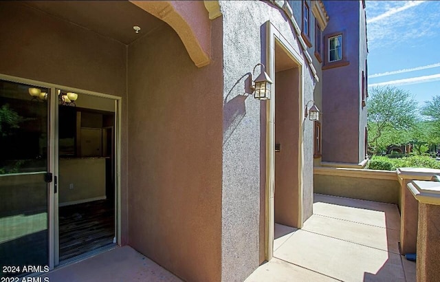 3935 E Rough Rider Rd Unit 1101, Phoenix, AZ 85050 - doorway to property featuring stucco siding