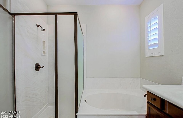 3935 E Rough Rider Rd Unit 1101, Phoenix, AZ 85050 - bathroom with a garden tub, a shower stall, and vanity
