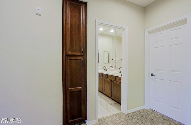 3935 E Rough Rider Rd Unit 1101, Phoenix, AZ 85050 - corridor featuring light carpet and light tile patterned floors