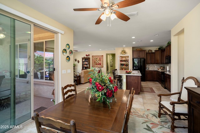 dining area featuring ceiling fan, recessed lighting, and visible vents