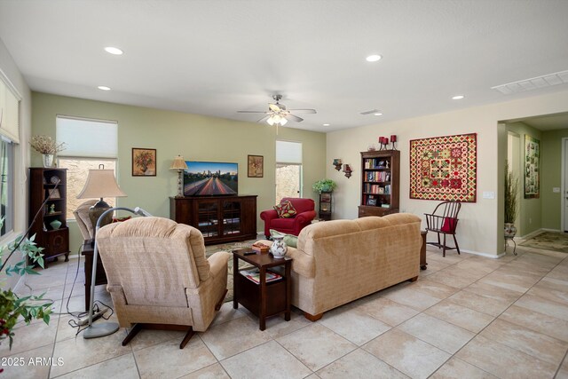 living area featuring a ceiling fan, recessed lighting, light tile patterned flooring, and visible vents