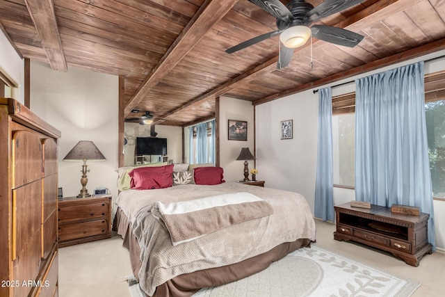 bedroom featuring light colored carpet, ceiling fan, and wooden ceiling