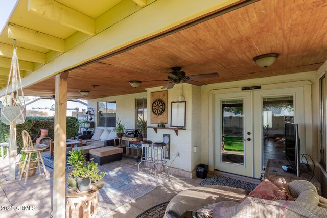 view of patio featuring ceiling fan and an outdoor hangout area