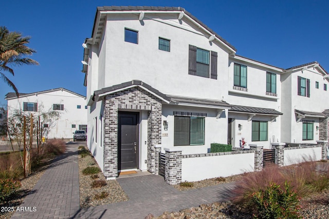 view of front of property featuring stucco siding