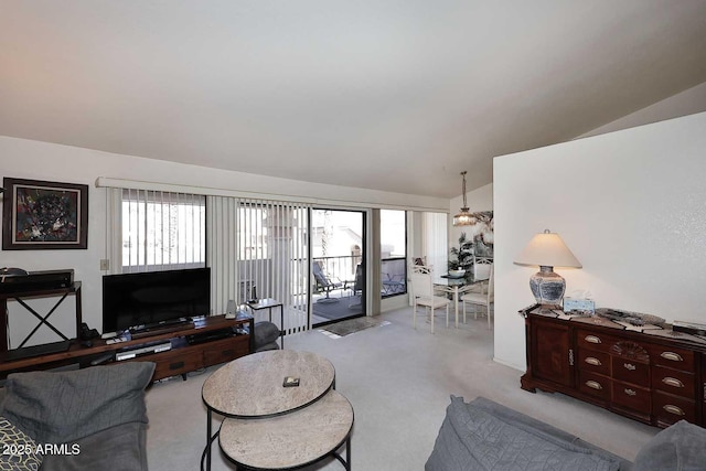 living room featuring lofted ceiling