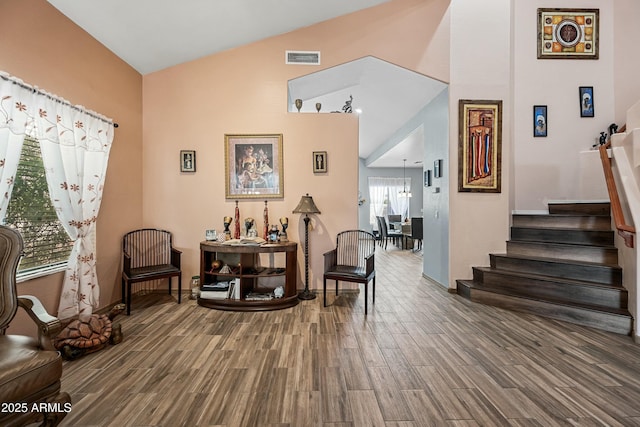 living area with lofted ceiling