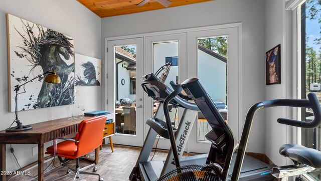 exercise area featuring wooden ceiling and brick floor