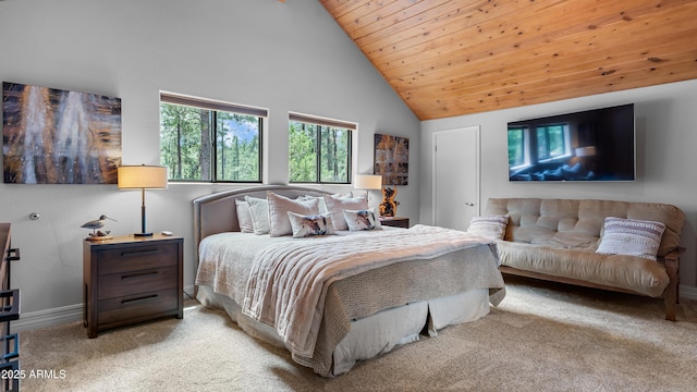 bedroom with baseboards, carpet, high vaulted ceiling, and wooden ceiling