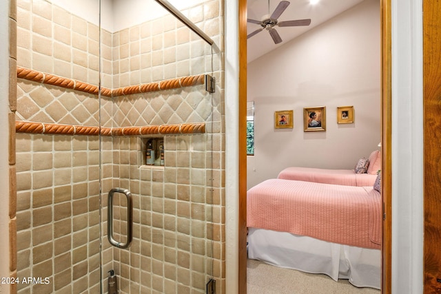 bedroom featuring lofted ceiling, ceiling fan, and carpet flooring