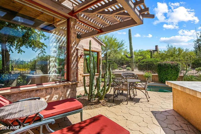 view of patio / terrace featuring a pergola and a fenced in pool