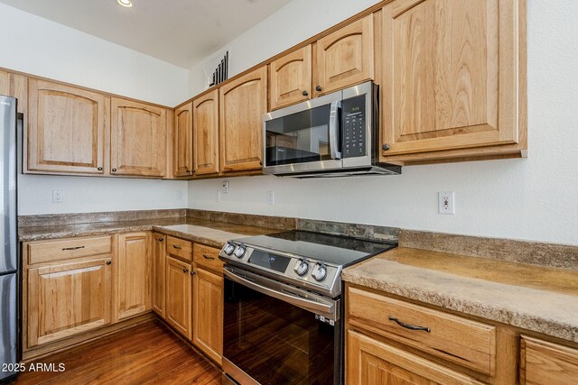 1031 W Longhorn Dr, Chandler, AZ 85286 - kitchen featuring stainless steel appliances and dark wood finished floors