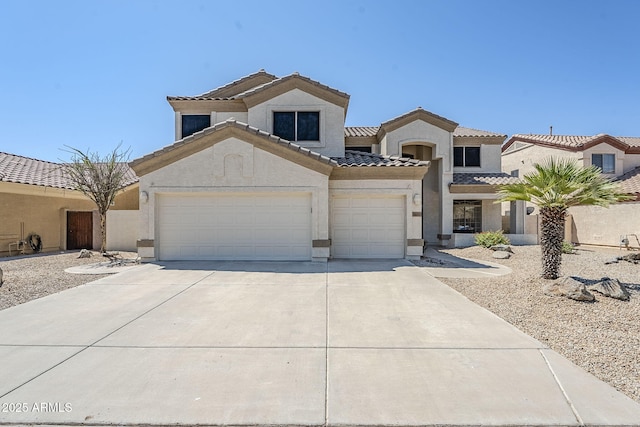 1031 W Longhorn Dr, Chandler, AZ 85286 - view of front of house featuring stucco siding, driveway, a tile roof, and a garage
