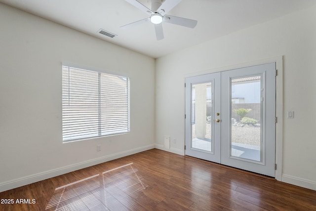 1031 W Longhorn Dr, Chandler, AZ 85286 - empty room with french doors, plenty of natural light, and wood finished floors