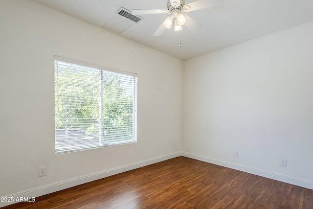 1031 W Longhorn Dr, Chandler, AZ 85286 - spare room featuring healthy amount of natural light, wood finished floors, and baseboards