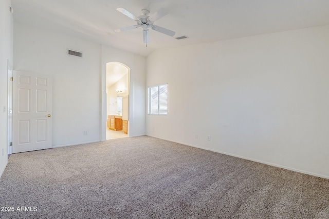 1031 W Longhorn Dr, Chandler, AZ 85286 - unfurnished bedroom with arched walkways, carpet flooring, baseboards, and ensuite bath