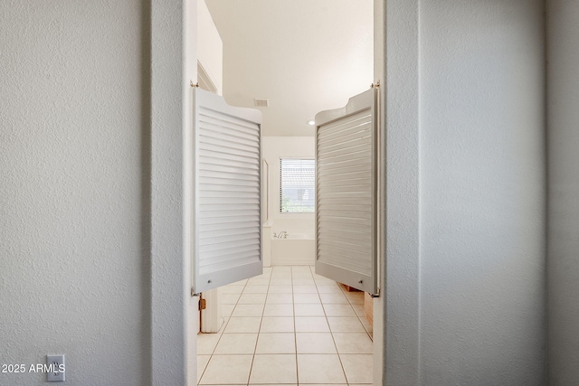 1031 W Longhorn Dr, Chandler, AZ 85286 - hallway with light tile patterned floors