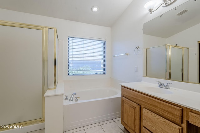 1031 W Longhorn Dr, Chandler, AZ 85286 - full bathroom featuring a shower stall, vanity, a garden tub, and tile patterned floors