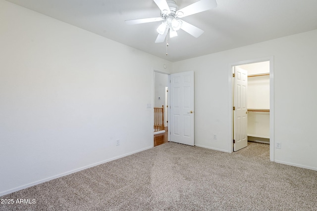 1031 W Longhorn Dr, Chandler, AZ 85286 - unfurnished bedroom with carpet, baseboards, a spacious closet, and a ceiling fan