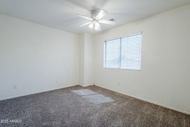 1031 W Longhorn Dr, Chandler, AZ 85286 - spare room with carpet floors, ceiling fan, and baseboards