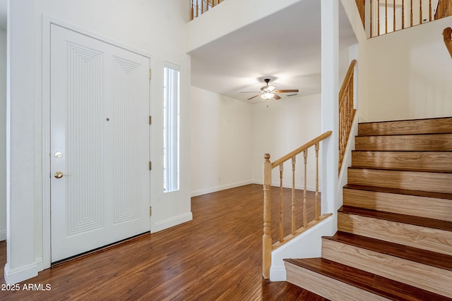 1031 W Longhorn Dr, Chandler, AZ 85286 - foyer featuring wood finished floors, stairway, ceiling fan, and baseboards