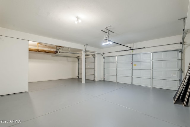 1031 W Longhorn Dr, Chandler, AZ 85286 - garage with a garage door opener and baseboards
