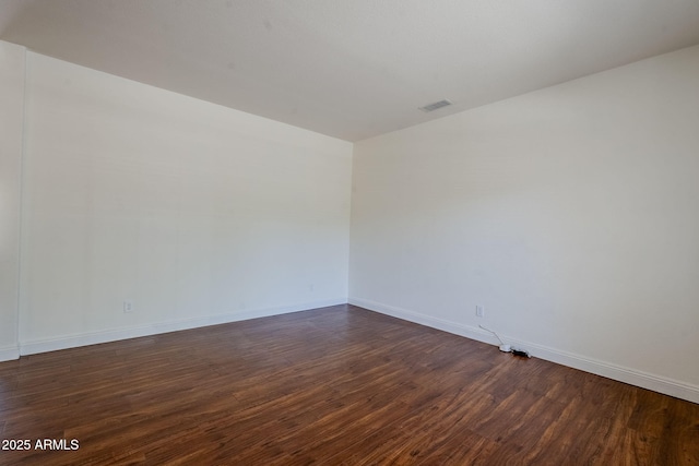 1031 W Longhorn Dr, Chandler, AZ 85286 - unfurnished room featuring dark wood-type flooring and baseboards