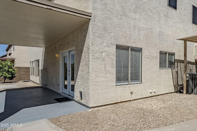 1031 W Longhorn Dr, Chandler, AZ 85286 - view of property exterior featuring a patio area and stucco siding