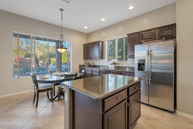 2472 E Prescott Pl, Chandler, AZ 85249 - kitchen with stainless steel fridge with ice dispenser, plenty of natural light, dark brown cabinets, baseboards, and recessed lighting
