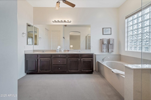 2472 E Prescott Pl, Chandler, AZ 85249 - full bath with a ceiling fan, a garden tub, double vanity, and a shower