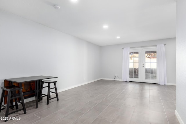 empty room featuring french doors