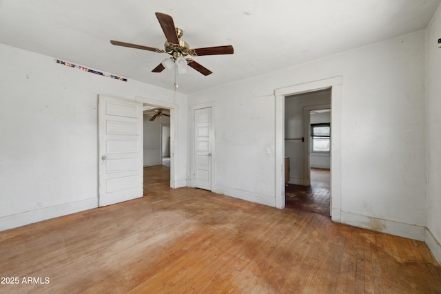 5901 E Short Ave, Globe, AZ 85501 - unfurnished bedroom with light wood-style floors and a ceiling fan