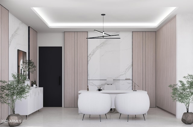 bathroom with a raised ceiling