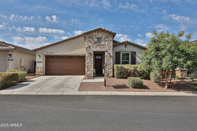 19946 W Glenrosa Ave, Litchfield Park, AZ 85340 - view of front of property with a garage, stucco siding, concrete driveway, and stone siding