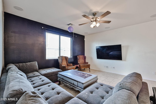 19946 W Glenrosa Ave, Litchfield Park, AZ 85340 - living area with ceiling fan, visible vents, baseboards, and tile patterned flooring