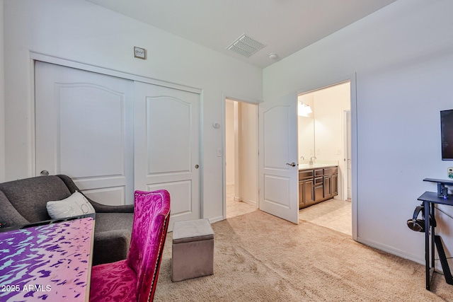 19946 W Glenrosa Ave, Litchfield Park, AZ 85340 - bedroom with visible vents, baseboards, a closet, and light carpet