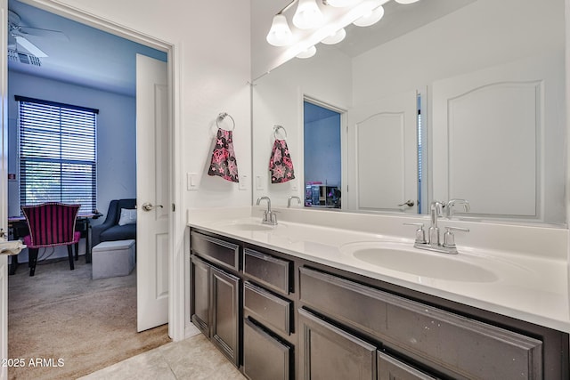 19946 W Glenrosa Ave, Litchfield Park, AZ 85340 - bathroom with a sink, tile patterned flooring, double vanity, and visible vents