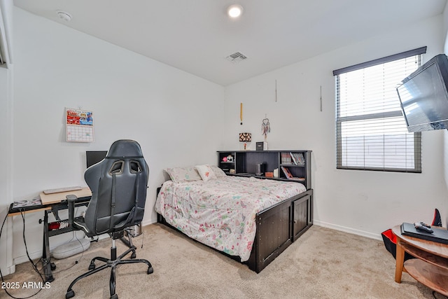 19946 W Glenrosa Ave, Litchfield Park, AZ 85340 - bedroom featuring baseboards, visible vents, and light colored carpet