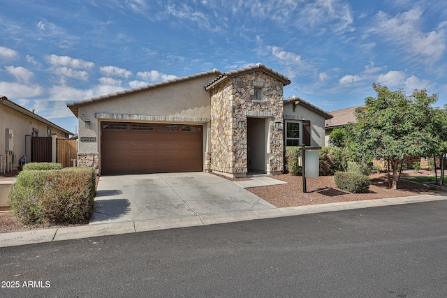 19946 W Glenrosa Ave, Litchfield Park, AZ 85340 - view of front of house featuring an attached garage, stucco siding, a tile roof, and stone siding