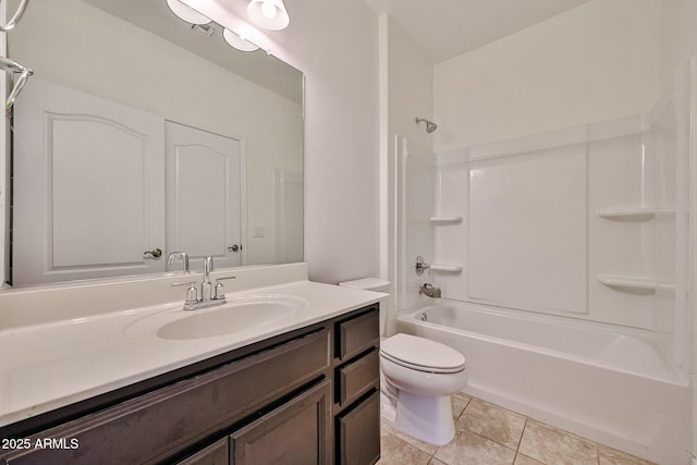 19946 W Glenrosa Ave, Litchfield Park, AZ 85340 - bathroom featuring tile patterned floors, vanity, toilet, and bathing tub / shower combination
