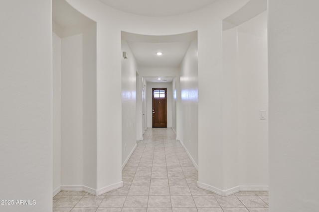 19946 W Glenrosa Ave, Litchfield Park, AZ 85340 - hallway with baseboards and light tile patterned flooring