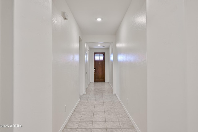 19946 W Glenrosa Ave, Litchfield Park, AZ 85340 - hall featuring light tile patterned flooring, baseboards, and recessed lighting