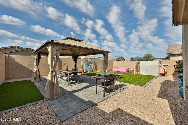 19946 W Glenrosa Ave, Litchfield Park, AZ 85340 - view of patio with a gazebo, a fenced backyard, and outdoor dining space