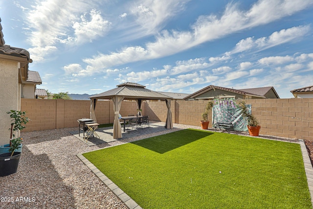 19946 W Glenrosa Ave, Litchfield Park, AZ 85340 - view of yard featuring a patio, a gazebo, and a fenced backyard