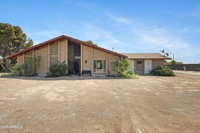 2921 N 103rd Ave, Avondale, AZ 85392 - mid-century modern home featuring brick siding
