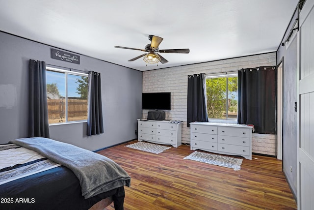2921 N 103rd Ave, Avondale, AZ 85392 - bedroom featuring wood finished floors and a ceiling fan
