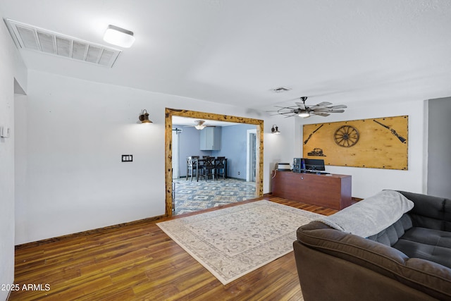 2921 N 103rd Ave, Avondale, AZ 85392 - living room with a ceiling fan and wood finished floors