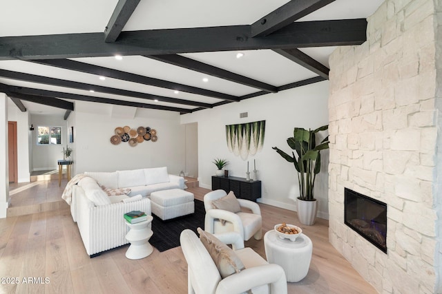 908 W Pershing Ave, Phoenix, AZ 85029 - living room with light wood finished floors, beam ceiling, recessed lighting, and a fireplace